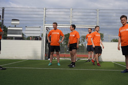 The DYN/PAS Team warming up on the field before the match.