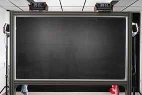 The fully assembled LightBoard with black backdrop and illumination.