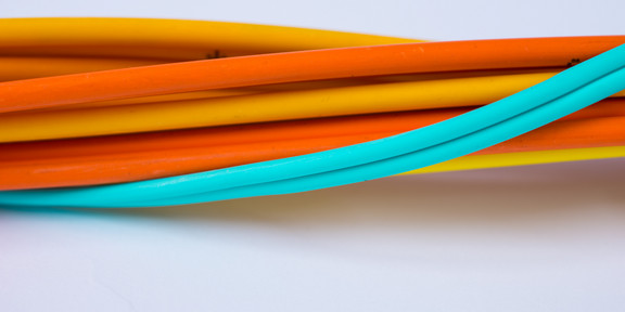 Various intertwined cables in close-up